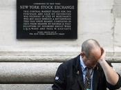 weary trader rubs eyes pauses outside York Stock Exchange following trading session October 2008. Jones Industrial Average dropped 678.91 points finish 8579.19 closing below 9,0...